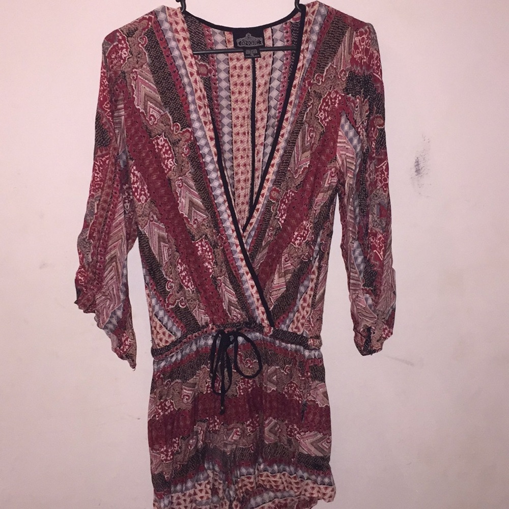 A low cut V-neck romper